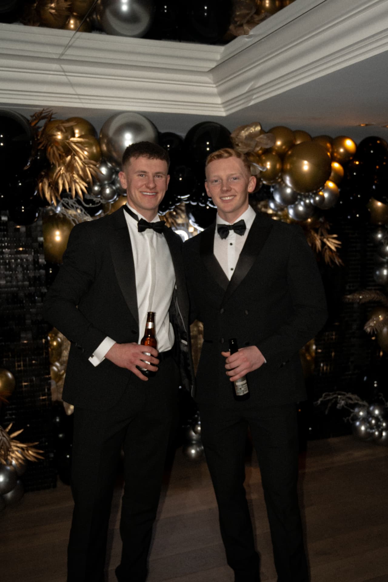 Two members in black tie