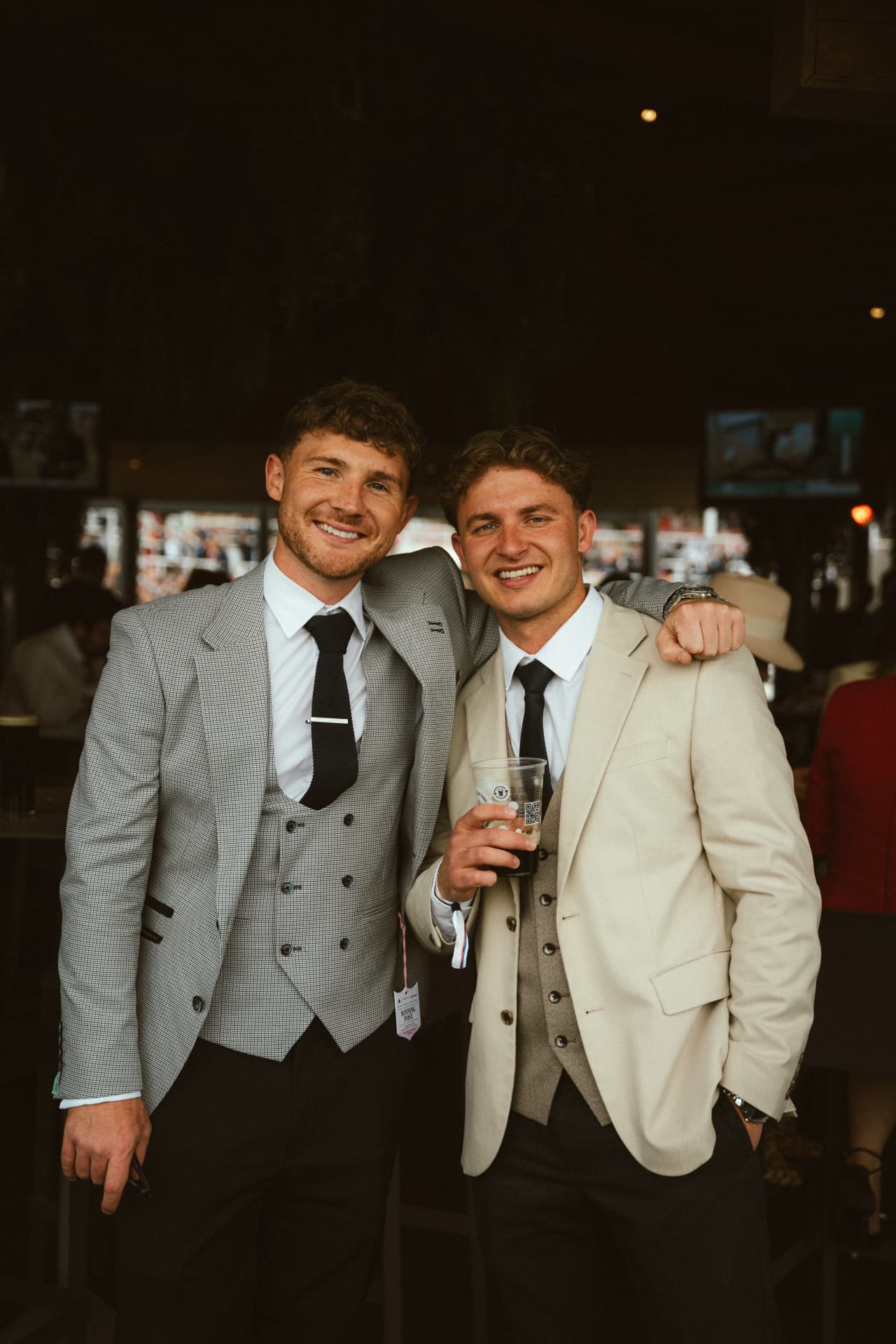 Two members at a race day